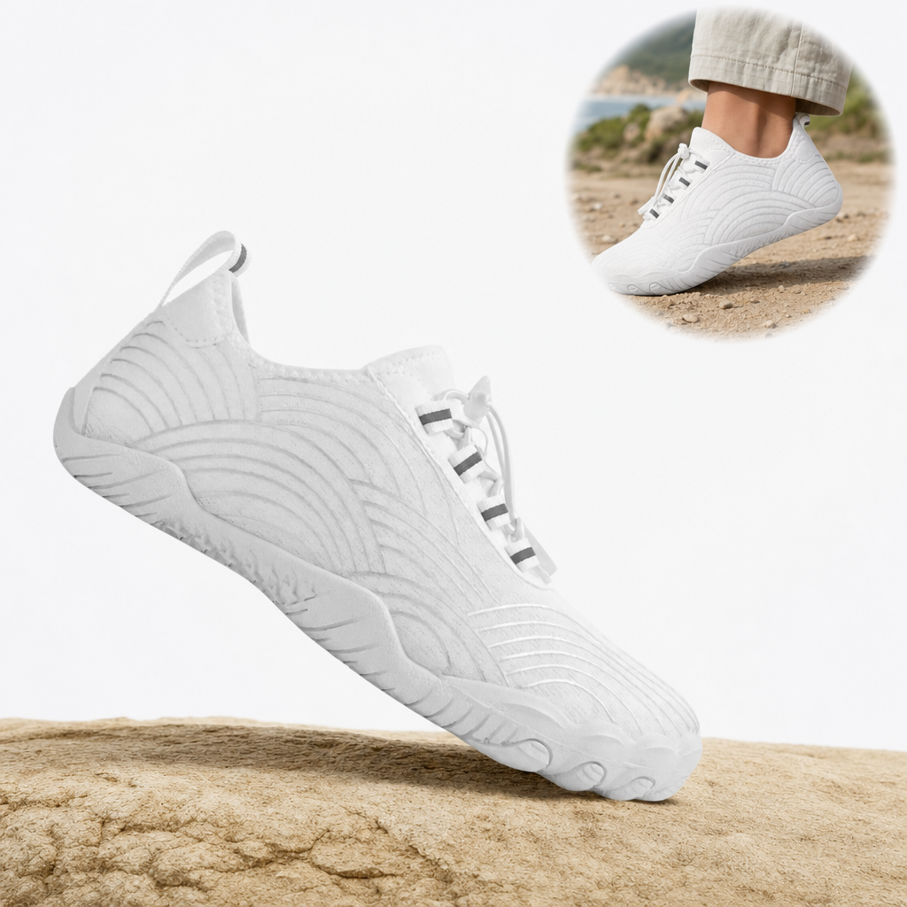 Nubora white barefoot shoe on rock with in-use inset